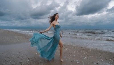 1girl,solo,long hair,breasts,brown hair,black hair,dress,bare shoulders,medium breasts,full body,closed eyes,outdoors,sky,barefoot,day,cloud,water,lips,strapless,blue dress,ocean,beach,cloudy sky,wind,strapless dress,walking,realistic,sand,waves,dancing,shore