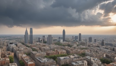 outdoors,sky,cloud,water,tree,no humans,ocean,sunlight,cloudy sky,building,scenery,sunset,city,horizon,cityscape,river,skyscraper,tower,landscape