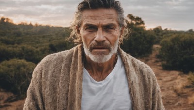 solo,looking at viewer,short hair,shirt,1boy,closed mouth,white shirt,upper body,male focus,outdoors,sky,cloud,blurry,black eyes,tree,blurry background,facial hair,nature,facing viewer,beard,brown jacket,realistic,mustache,manly,old,old man,wrinkled skin,black hair,jacket,scar,scar on face,scar across eye,photo background