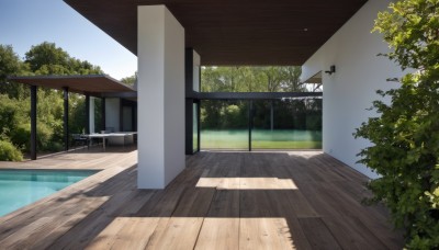 outdoors,sky,day,water,tree,blue sky,no humans,window,shadow,sunlight,grass,plant,building,nature,scenery,wooden floor,door,bench,bush,shade