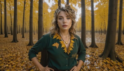 1girl,solo,long hair,looking at viewer,brown hair,shirt,long sleeves,brown eyes,jewelry,upper body,outdoors,parted lips,day,belt,necklace,tree,lips,buttons,leaf,wavy hair,nature,sleeves rolled up,forest,curly hair,hands on hips,realistic,green shirt,autumn leaves,autumn,teeth,blue shirt