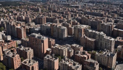 outdoors,sky,water,tree,no humans,from above,building,scenery,city,cityscape,river,skyscraper,real world location,landscape