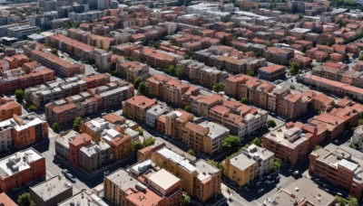 outdoors,day,tree,no humans,from above,building,scenery,city,road,cityscape,ruins,window,ground vehicle,nature,motor vehicle,car,house,rooftop,town,truck