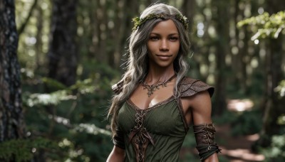 1girl,solo,long hair,breasts,looking at viewer,smile,dress,cleavage,brown eyes,jewelry,medium breasts,upper body,grey hair,outdoors,dark skin,necklace,armor,blurry,dark-skinned female,tree,lips,depth of field,blurry background,nature,armlet,forest,green dress,realistic,nose,head wreath,large breasts