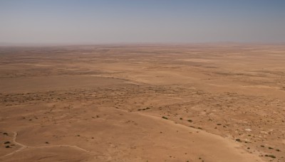 outdoors,sky,day,blue sky,no humans,ocean,beach,scenery,sand,horizon,shore,desert,footprints,rock