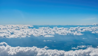 monochrome,outdoors,sky,day,cloud,blue sky,no humans,ocean,cloudy sky,scenery,blue theme,horizon,above clouds,water