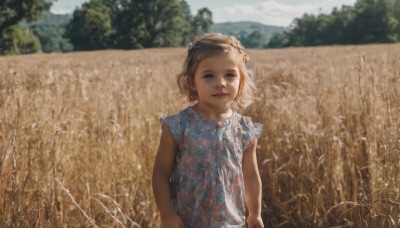 1girl,solo,looking at viewer,smile,short hair,brown hair,shirt,dress,brown eyes,closed mouth,upper body,short sleeves,outdoors,sky,sleeveless,day,artist name,signature,mole,blurry,black eyes,tree,depth of field,blurry background,blue dress,floral print,child,realistic,female child,field,lips,wind,nature,scenery