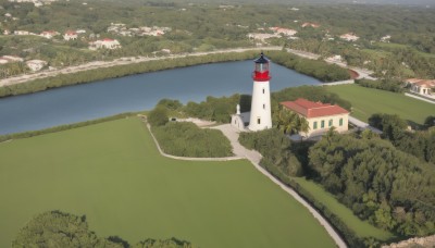 outdoors,day,water,tree,no humans,grass,building,nature,scenery,forest,city,road,bush,house,bridge,river,landscape,lake,path,town,sky,ocean,mountain,field,tower,lighthouse