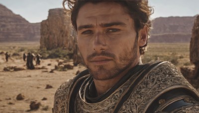 solo,looking at viewer,short hair,brown hair,1boy,closed mouth,upper body,male focus,outdoors,solo focus,day,armor,blurry,black eyes,blurry background,facial hair,portrait,beard,realistic,mustache,stubble,photo background,desert,chainmail,smile,brown eyes,sky,depth of field,shoulder armor,pauldrons,rock,sand,horse