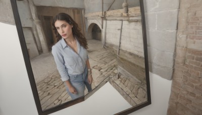 1girl,solo,long hair,breasts,looking at viewer,brown hair,shirt,hair ornament,cleavage,brown eyes,jewelry,medium breasts,standing,collarbone,white shirt,hairclip,collared shirt,belt,pants,bracelet,lips,window,from above,wavy hair,denim,sleeves rolled up,pocket,watch,jeans,door,wristwatch,breast pocket,wall,brick wall,from outside,realistic