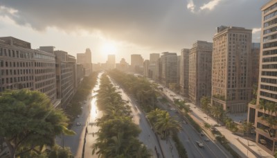 outdoors,sky,day,cloud,tree,blue sky,no humans,bird,sunlight,cloudy sky,plant,ground vehicle,building,scenery,motor vehicle,sunset,city,sun,car,road,cityscape,lamppost,street,skyscraper,road sign,crosswalk,water,bush,bridge,river,real world location