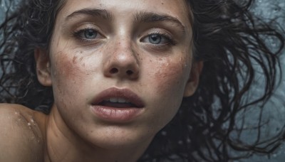 1girl,solo,long hair,looking at viewer,open mouth,blue eyes,black hair,lying,parted lips,teeth,water,mole,lips,wet,grey eyes,upper teeth only,portrait,close-up,freckles,realistic,nose,wet hair,mole on cheek,bare shoulders,eyelashes,dirty,dirty face