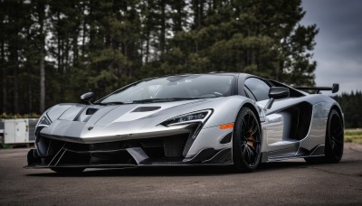 outdoors,sky,cloud,tree,no humans,ground vehicle,nature,motor vehicle,forest,car,road,vehicle focus,wheel,sports car,solo,from side,logo,photo background