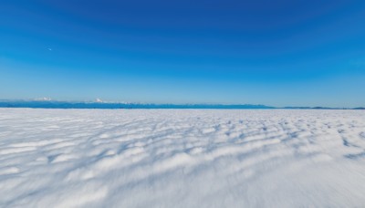 outdoors,sky,day,cloud,water,blue sky,no humans,bird,ocean,beach,building,scenery,blue theme,sand,horizon,waves,shore,monochrome