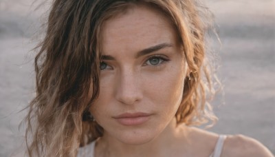 1girl,solo,long hair,looking at viewer,short hair,blue eyes,brown hair,jewelry,closed mouth,earrings,outdoors,mole,blurry,lips,grey eyes,eyelashes,depth of field,blurry background,wavy hair,messy hair,portrait,close-up,freckles,curly hair,realistic,nose,smile,blonde hair,bare shoulders,green eyes,sky,cloud,mole under eye,piercing,cloudy sky,wind,mole on cheek