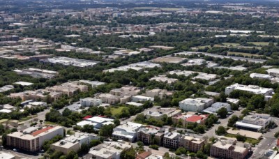 outdoors,tree,no humans,from above,building,nature,scenery,forest,city,road,cityscape,house,river,landscape,day,ground vehicle,motor vehicle,car,town,real world location