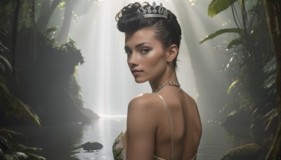 1girl,solo,breasts,looking at viewer,short hair,black hair,dress,bare shoulders,jewelry,upper body,outdoors,parted lips,looking back,dark skin,water,necklace,hair bun,from behind,black eyes,dark-skinned female,tree,lips,leaf,back,sunlight,single hair bun,tiara,plant,nature,forest,freckles,light rays,realistic,nose,waterfall,earrings,crown