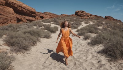 1girl,solo,long hair,smile,open mouth,brown hair,black hair,dress,bare shoulders,standing,outdoors,sky,barefoot,sleeveless,day,dark skin,dark-skinned female,blue sky,sleeveless dress,shadow,walking,sand,wide shot,orange dress,desert,footprints,dirty feet,signature,beach,wind,rock