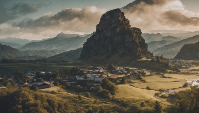 outdoors,sky,day,cloud,water,tree,no humans,cloudy sky,grass,building,nature,scenery,forest,mountain,road,architecture,house,river,landscape,mountainous horizon,hill,rock,sand,shore