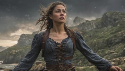 1girl,solo,long hair,breasts,brown hair,shirt,long sleeves,brown eyes,collarbone,upper body,braid,outdoors,parted lips,sky,belt,cloud,blurry,lips,looking to the side,floating hair,looking away,cloudy sky,looking up,blue shirt,wind,corset,snow,mountain,realistic,nose,brown belt,looking afar,leather,parody,curly hair,strap,dirty