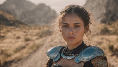 1girl,solo,looking at viewer,short hair,blue eyes,brown hair,black hair,brown eyes,upper body,outdoors,parted lips,artist name,hair bun,armor,blurry,lips,blurry background,wind,shoulder armor,portrait,freckles,pauldrons,breastplate,realistic,dirty face,jewelry,closed mouth,earrings,sunlight,nose