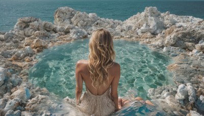 1girl,solo,long hair,blonde hair,brown hair,dress,bare shoulders,sitting,outdoors,barefoot,day,dark skin,water,from behind,white dress,dark-skinned female,ocean,back,wavy hair,partially submerged,rock,backless outfit,yokozuwari,facing away,bare back,backless dress,waves,median furrow,upper body,strapless,strapless dress,shore