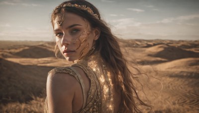 1girl,solo,long hair,looking at viewer,blue eyes,brown hair,black hair,bare shoulders,jewelry,closed mouth,upper body,outdoors,sky,sleeveless,day,looking back,cloud,from behind,blurry,lips,grey eyes,blurry background,circlet,mountain,realistic,nose,field,desert,parted lips,tiara,wind