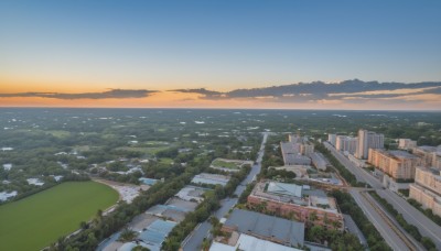 outdoors,sky,cloud,water,tree,no humans,ocean,building,scenery,sunset,mountain,city,horizon,road,cityscape,bridge,river,landscape,hill,beach,plant,nature,shore,town