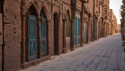 outdoors,sky,day,no humans,window,shadow,building,scenery,city,door,road,lamppost,pillar,street,alley,pavement,blue sky,sunlight,architecture,ruins,arch,column,stone floor,vanishing point