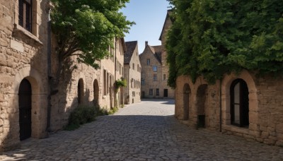 outdoors,sky,day,tree,blue sky,no humans,window,shadow,sunlight,plant,building,scenery,door,road,bush,shade,wall,house,path,arch,pavement,architecture,stone wall