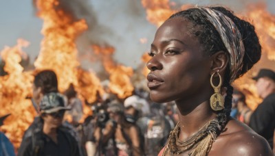 1girl,black hair,hat,bare shoulders,brown eyes,jewelry,braid,earrings,outdoors,parted lips,multiple boys,solo focus,day,dark skin,necklace,blurry,dark-skinned female,lips,blurry background,headband,fire,portrait,6+boys,hoop earrings,realistic,crowd,very dark skin,long hair,sky,depth of field