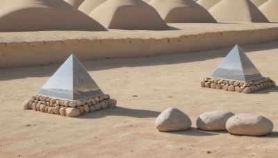 outdoors,day,no humans,shadow,scenery,rock,sand,still life,desert,stone,sky,sepia,brown theme,wood