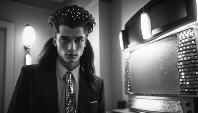 solo,long hair,looking at viewer,shirt,1boy,closed mouth,jacket,monochrome,upper body,greyscale,male focus,necktie,collared shirt,indoors,dark skin,parody,formal,suit,ground vehicle,motor vehicle,realistic,car,star (symbol),blurry,lamp,television,screen