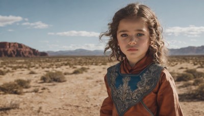 1girl,solo,looking at viewer,short hair,blue eyes,brown hair,jewelry,closed mouth,upper body,outdoors,sky,day,cloud,medium hair,blurry,blue sky,lips,blurry background,curly hair,mountain,realistic,dirty,desert,long hair,scarf,expressionless,sunlight,cloudy sky,wind