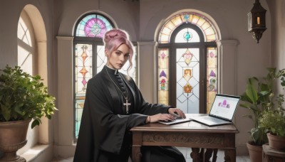 1girl,solo,looking at viewer,short hair,blue eyes,long sleeves,dress,jewelry,sitting,closed mouth,pink hair,indoors,wide sleeves,necklace,hair bun,black dress,lips,book,window,chair,table,single hair bun,cross,plant,black nails,robe,reading,nun,potted plant,cross necklace,laptop,stained glass,church,black robe,earrings,realistic,nose,computer