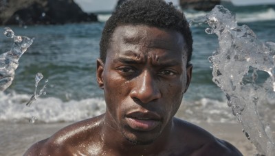 solo,looking at viewer,short hair,black hair,1boy,brown eyes,male focus,outdoors,parted lips,teeth,day,dark skin,water,blurry,lips,blurry background,facial hair,ocean,beach,dark-skinned male,portrait,beard,ice,realistic,sand,splashing,waves,photo background,closed mouth,upper body,water drop,rock,very short hair