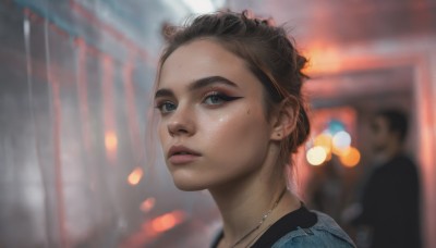 1girl,looking at viewer,short hair,brown hair,black hair,1boy,jewelry,earrings,outdoors,parted lips,teeth,solo focus,necklace,mole,blurry,black eyes,lips,mole under eye,depth of field,blurry background,denim,portrait,freckles,realistic,nose,very short hair,solo,blue eyes,eyelashes,makeup,eyeshadow,bokeh