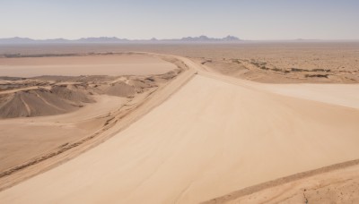 outdoors,sky,day,blue sky,no humans,beach,scenery,mountain,sand,horizon,road,field,landscape,mountainous horizon,shore,desert,footprints,monochrome,water,ocean