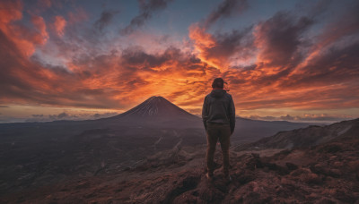 solo, 1boy, standing, male focus, outdoors, sky, pants, cloud, hood, from behind, hoodie, hood down, cloudy sky, scenery, sunset, mountain