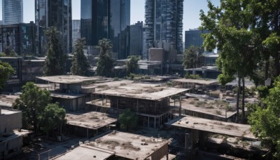 outdoors,sky,day,cloud,tree,blue sky,no humans,window,plant,building,scenery,city,road,cityscape,ruins,skyscraper,overgrown,real world location,post-apocalypse