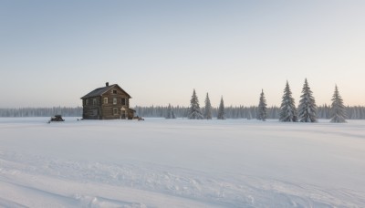 outdoors,sky,day,tree,military,no humans,window,ground vehicle,building,nature,scenery,motor vehicle,snow,forest,mountain,house,winter,bare tree,pine tree,water,landscape