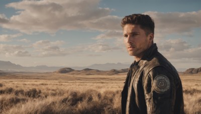 solo,short hair,brown hair,shirt,black hair,1boy,jacket,upper body,male focus,outdoors,necktie,sky,day,cloud,vest,black jacket,facial hair,grass,scenery,black necktie,mountain,realistic,stubble,field,leather jacket,looking at viewer,brown eyes,signature,blue sky,looking to the side,expressionless,cloudy sky