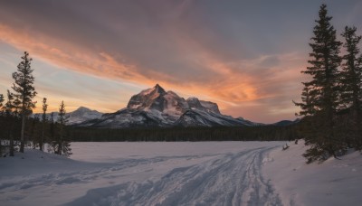 outdoors,sky,cloud,tree,no humans,bird,cloudy sky,nature,scenery,snow,forest,sunset,mountain,winter,bare tree,evening,landscape,mountainous horizon,gradient sky,orange sky,pine tree,water,reflection,lake