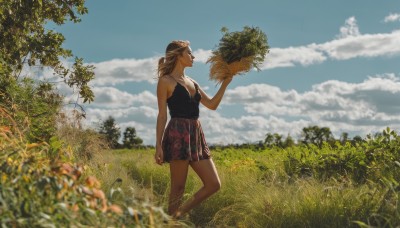 1girl,solo,long hair,breasts,open mouth,skirt,brown hair,holding,cleavage,bare shoulders,standing,outdoors,sky,sleeveless,day,cloud,medium hair,blurry,from side,tree,blue sky,profile,depth of field,cloudy sky,grass,plant,nature,scenery,medium breasts,pointy ears,bare arms,red skirt,looking up,field