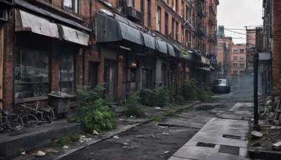 outdoors,day,tree,no humans,window,plant,ground vehicle,building,scenery,motor vehicle,city,sign,car,road,ruins,power lines,lamppost,street,bicycle,utility pole,pavement,sky,cloud,rain,house,air conditioner