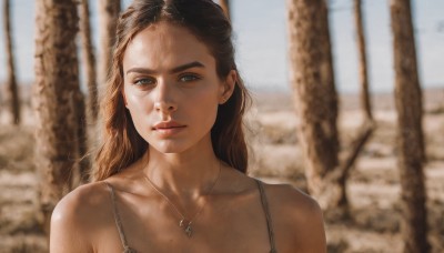 1girl,solo,long hair,looking at viewer,brown hair,bare shoulders,brown eyes,jewelry,closed mouth,collarbone,upper body,earrings,outdoors,day,necklace,mole,blurry,lips,blurry background,portrait,freckles,mole on breast,realistic,mole on cheek,tree,depth of field,sunlight