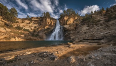 outdoors,sky,day,cloud,water,tree,blue sky,no humans,cloudy sky,nature,scenery,forest,rock,mountain,river,waterfall,landscape,cliff,sand,desert