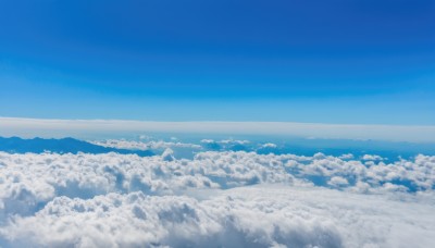 monochrome,outdoors,sky,day,cloud,water,blue sky,no humans,ocean,cloudy sky,scenery,blue theme,horizon,landscape,above clouds,nature,waves