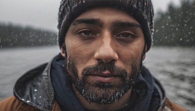 solo,looking at viewer,short hair,black hair,1boy,hat,closed mouth,jacket,male focus,outdoors,scarf,blurry,black eyes,blurry background,facial hair,thick eyebrows,portrait,beard,snow,close-up,snowing,realistic,mustache,beanie,straight-on,upper body,tree,lips,black headwear,depth of field,winter,grey sky