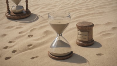 outdoors,artist name,english text,cup,no humans,shadow,beach,scenery,sand,jar,still life,desert,signature,water,bottle,drinking glass,glass,footprints,hourglass